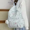 Mochila de estudante de ensino médio graffiti transfronteiriça universitário nicho versátil estampa de estrela bolsa escolar mochila de grande capacidade feminina