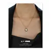 Diseño Original al por Mayor Francés Retro Nácar Natural Circonita Negro Lujo Ligero Nicho Gama Alta Collar para Clavícula para Mujer