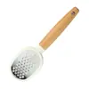 Juego de 11 Utensilios de Cocina con Mangos de Madera de Haya: Batidor de huevos, Pelador, Abridor de botellas, Cortador de pasteles, Ablandador de carne, Prensa de ajos, Rallador