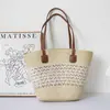 Nova bolsa feminina de palha trançada de verão, moderna e versátil para férias na praia, bolsa tote de grande capacidade, bolsa de ombro, tendência