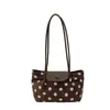 Bolso japonés textura simple bolso de hombro individual coreano gran capacidad 2026 nuevo otoño gamuza axila exquisito