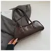 Bolsa de Mão Pequena Retrô Tendência Nova Luxo Moda Versátil Transversal Feminina Nicho Bolsa Boston