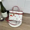 Estampado de cerezas fresco y lindo 2026 nueva moda moderna nicho elegante dulce bolso de mano de un solo hombro bandolera bolso caja
