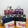 Bolsa de viaje de corta distancia para mujer, de un solo hombro, portátil, de gran capacidad, de moda, estilo coreano, bolsa de equipaje de viaje para hombre.