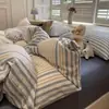 Juego de ropa de cama de cuatro piezas de algodón lavado a cuadros, funda de edredón de algodón puro para dormitorio, juego de tres piezas para estudiante universitario, hilo de burbujas estilo minimalista