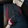Calça de Moletom Estampada com Estrelas por Toda Parte Estilo Retro Americano Masculina Outono Design Retro Americano Calças Esportivas Retas Casuais