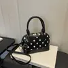 Bolsa Estilosa de Concha com Bolinhas 2026 Chegada Nova de Verão Nicho Textura de Alta Qualidade Tendência Minimalista Bolsa de Ombro Bolsa Transversal Bolsa de Mão