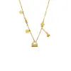 Collar con colgante de bolsa de filigrana fructífera chapado en oro de 18 quilates antiguo, borla, florecilla, cadena para la clavícula de lujo ligero de alta gama
