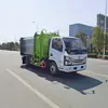 O Dongfeng 11, um caminhão coletor de lixo autocarregável e autodescarregável, é usado para coletar e transportar resíduos domésticos em áreas residenciais e zonas industriais, e também é usado para operações de saneamento.