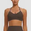 Sujetador deportivo de yoga estilo europeo y americano con diseño de cuello halter, que ofrece soporte para la espalda, absorción de impactos y propiedades de secado rápido, adecuado para correr, fitness y yoga