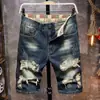 Shorts de mezclilla de 5 puntos rotos para hombre, pantalones de longitud media modernos, versátiles y a la moda, shorts delgados de retazos desgastados de verano
