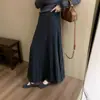 Falda de punto de longitud media para mujer, nueva colección otoño/invierno 2026, con un estilo coreano fluido y casual, cintura alta y una silueta amplia en A.