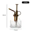 Al por mayor Nuevo Riego Retro Estampado Girasol Vitral Pequeña Regadera Presión Jardinería Tetera de Riego para Uso en Casa