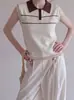 Top de punto sin mangas con cuello polo estilo coreano y bloques de color para mujer, modelo verano 2026, moderno, de corte holgado, con una gran estética de diseño