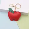 Nuevo Lindo Encanto de Bolso con Forma de Manzana Frutal con Diseño Personalizado, Llavero Colgante de Cuero PU de Manzana Al Por Mayor
