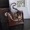 Bolso de axila de gran capacidad para mujer, nuevo bolso de hombro de moda 2026 para ir al trabajo, bolso tote versátil de nicho de alta gama