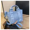 Transfronterizo 2025 Nuevo Verano Simple Bolsa de Lona para Mujer Gran Capacidad Bolso Tipo Cubo Moda Letra Mochila Cruzada