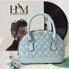 Popular bolsa de concha 2026, nuevo bolso de hombro de moda, bolso de mujer para el trabajo, bolso floral de bordado de hueso para teléfono móvil, bolso cruzado para mujer
