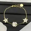 Transfronterizo Europeo y Americano 2025 Modelo Nuevo Réplica de Dior/Dior con Logo Blanco Nácar Trébol de Cuatro Hojas Estrella Cd Pulsera para Mujer Venta al por Mayor