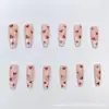 Set de 24 Piezas de Uñas Portátiles Transfronterizas, Pegatinas de Uñas Francesas Dulces de Corazón Rojo, Arte de Uñas Desmontable, Artículo Popular Transfronterizo