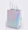 Bolsa de Sacola de TNT laminada a laser de plástico prateado de alta qualidade, bolsa para loja de roupas, ecológica, para compras, portátil
