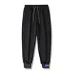 Calça Esportiva com Proteção Personalizada 2024 Nova Masculina Solta Tendência Versátil Calça com Forro nos Dedos Calça Casual Masculina