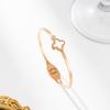 Conjunto de tres piezas de collar y pulsera con trébol de cuatro hojas en oro rosa que combina con todo, joyería ligera de acero y titanio para mujer.