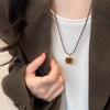 Collar de cuerda de cuero con piedra de ojo de tigre para otoño e invierno, estilo Maillard Yadan para mujer, cadena larga de lana, cadena de clavícula sencilla de moda.
