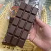 Brinquedo Squishy de Chocolate com Rebote Lento, Gadget para Alívio do Estresse, Textura Macia e Amassável, Perfeito para Presentear