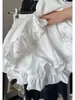 Elegante Falda Culotte Corta Elástica de Cintura Alta Adelgazante con Diseño de Burbuja y Botón de Tulipa