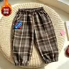Pantalones de Pana con Forro Polar Nuevos para Niños Otoño/Invierno 2026, Pantalones Jogger Casuales Sueltos Estilosos Coreanos a Cuadros para Exportación