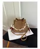 Bolsa de balde tecida de alta qualidade transfronteiriça para mulheres, nova de 2026, bolsa de ombro e transversal versátil de nicho vintage para o dia a dia