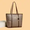 Bolso cruzado tipo cubo de un solo hombro con estampado de diseño de nicho popular de este año 2026 nuevo y elegante bolso de mano de gran capacidad para mujer