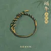 Pulseira de corda colorida zongzi do Festival do Barco-Dragão 2026 novo modelo pulseira trançada artesanal étnica infantil atacado corda vermelha