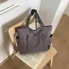 Bolsa de Verão Transfronteiriça Novo Modelo 2026 Grande Capacidade para Mulheres, Bolsa Casual Versátil para Estudante, Bolsa de Mão de Tecido Estilo Coreano