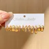 Pendientes de metal europeos y americanos, juego de joyería de alta gama para mujer, juego de pendientes de aro lisos de perla retorcida retro a la moda al por mayor