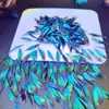 Incrustar plumas de martín pescador en ...