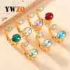 Anillo de apertura de acero de titanio transfronterizo europeo y americano, simple, geométrico, fundición, ovalado, incrustado, anillo de circón, joyería de oro de 18k, venta al por mayor