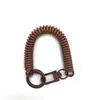 Hebilla de Puerta Pintada de Color Cuerda de Resorte Aleación Llavero de Resorte Llavero de Bolso Accesorios Línea de Honda Antiperdida Cordón