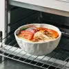Tigelas de arroz criativas minimalistas em cerâmica preto e branco estilo japonês, adequadas para uso doméstico, em hotéis e comercial, disponíveis para atacado, esteticamente agradáveis e projetadas como um conjunto para casal com motivo de folha de lótus