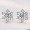 Nuevos pendientes navideños de copo de nieve, chapados en platino, con aguja de plata S925, dulces, románticos, elegantes y brillantes.