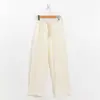 Pantalones casuales de color sólido de cintura media con textura waffle y efecto air puff para mujer, nuevos de primavera, estilo coreano, holgados con cordón ajustable y pernera ancha, a la moda