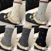 Calcetines de algodón puro de lunares para mujer, calcetines de otoño e invierno grises de media pantorrilla, calcetines de cachemira gruesos y cálidos, calcetines largos de algodón puro con encaje retro
