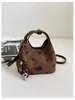 Bolso pequeño de mano de felpa y gamuza elegante transfronterizo para mujer, nuevo, textura retro, bolso tipo cubo, nicho, bandolera, bolso cruzado, moderno