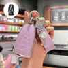 Adecuado para el estuche de llave de control remoto para automóviles Dongfeng Venucia V, VX6 y VDDi, una carcasa protectora de alta gama con una hebilla decorativa