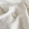 Nuevo anillo de plata de ley s925 versión coreana anillo minimalista de plata rota perla de agua dulce anillo de diseño de cuerda elástica a juego de color oro y plata nicho