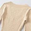Ins Ropa de mujer estilo europeo y americano al por mayor 2026 Otoño Nuevo Estilo Temperamento Cuello en V Tejido de punto Manga larga Ajustado Camiseta básica