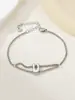Nuevo Anillo de Acero Inoxidable al por Mayor Transfronterizo 26 Letras Inglesas Anillo de Doble Capa Pulsera Chapada en Oro
