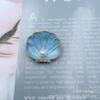 Broche de aleación con incrustaciones de vieiras y concha de perla estilo coreano retro con forma de gota de aceite, venta al por mayor