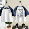Camiseta infantil de algodão puro com blocos de cor e manga curta 2026 verão unissex versátil moderna raglan manga meia-sleeve base